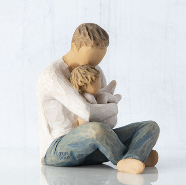 Willow Tree Little One 
seated father holding child in arms 
side view 